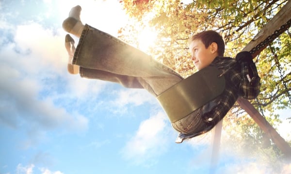 kid on a swing